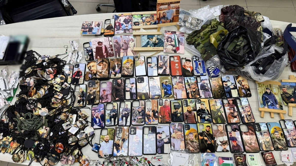 ضبط مواد تحريضية واعتقال صاحب محل تجاري