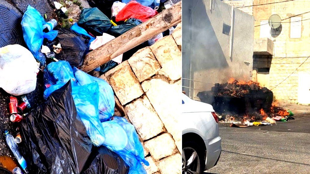 الناصرة: إشعال النيران في أكوام النفايات المتكدسة في حي الروم