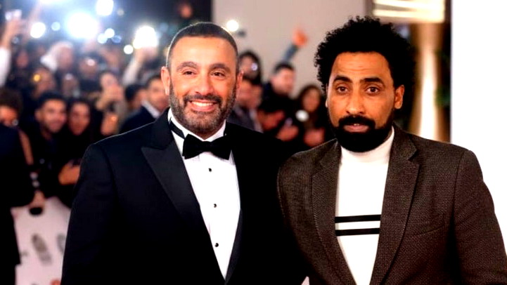 تعاون فني مستقبلي؟ صورة تجمع المخرج أحمد بوجي والفنان أحمد السقا خلال حفل فني