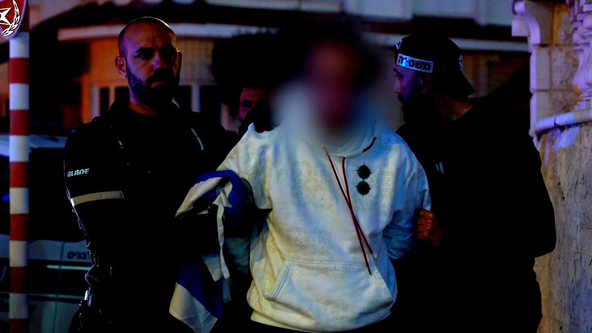 اعتقال شاب من اللد بشبهة رسم علم فلسطين على مبنى البلدية